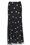 Lill skjørt i sort og hvit polkadots